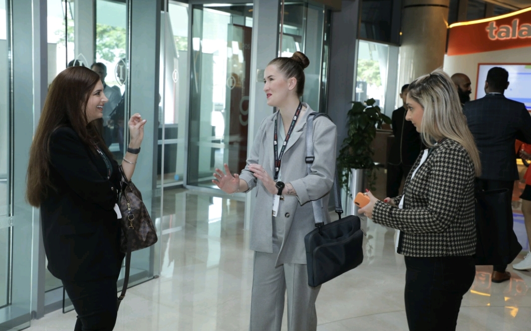 Kerry-Leigh Wohlers in conversation with clients at an industry event